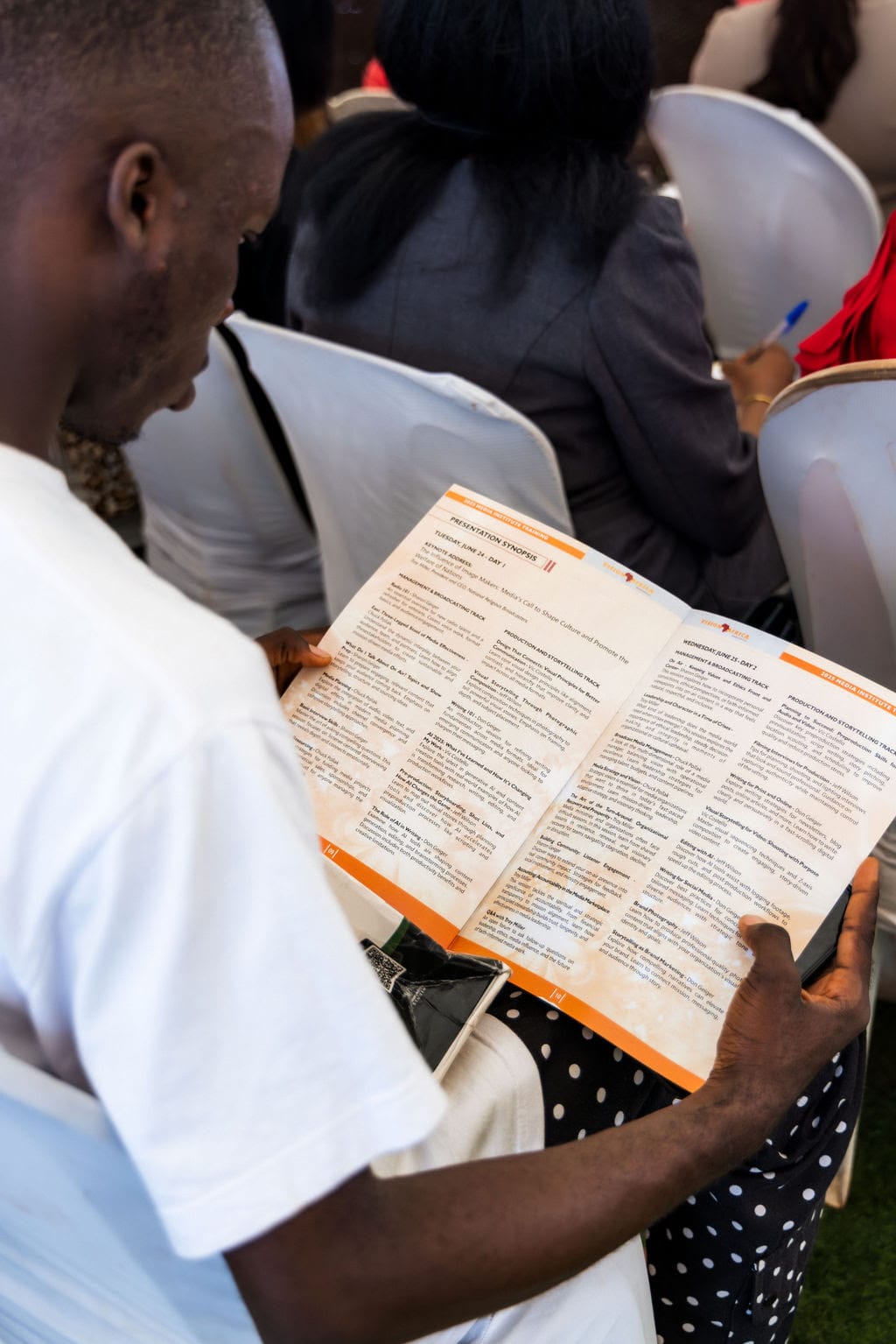 Man looks at Vision Africa's Media Institute program